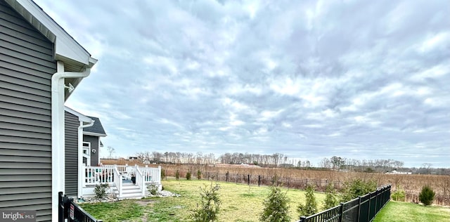 view of yard featuring a wooden deck