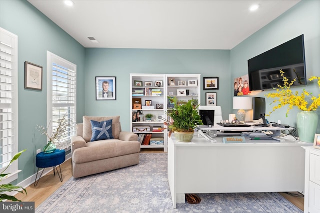 office space featuring hardwood / wood-style floors