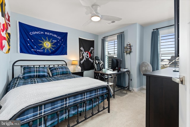 carpeted bedroom featuring ceiling fan