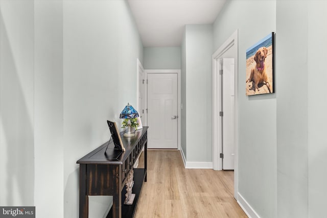 hallway featuring light hardwood / wood-style flooring