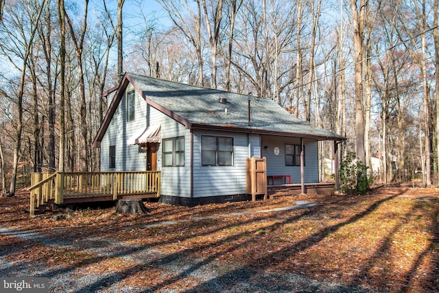 view of front of home with a wooden deck