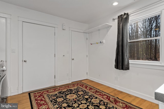 foyer with light wood-type flooring