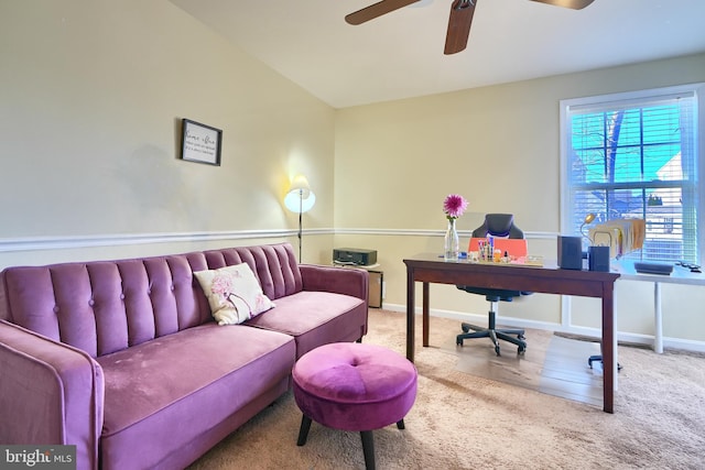 carpeted office with ceiling fan and lofted ceiling