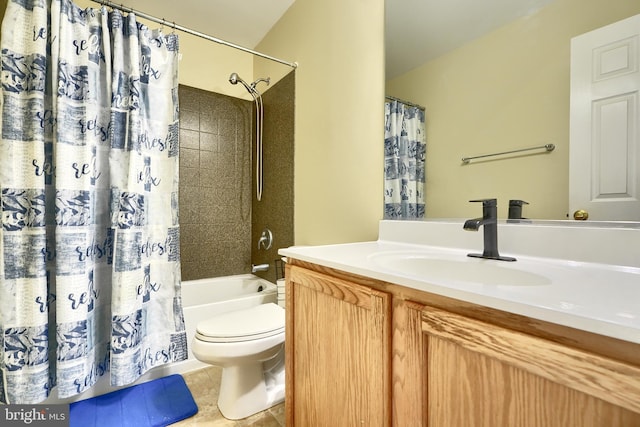 full bathroom featuring tile patterned floors, shower / bath combo with shower curtain, vanity, and toilet