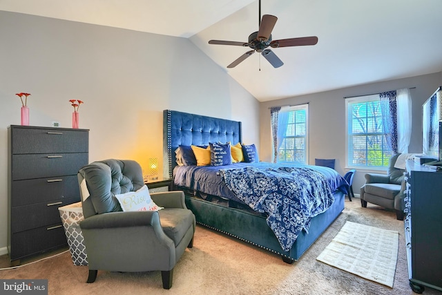 bedroom featuring carpet flooring, vaulted ceiling, and ceiling fan