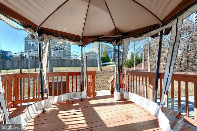wooden deck with a gazebo