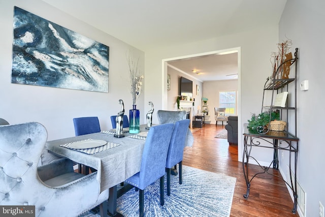 dining room featuring dark hardwood / wood-style flooring