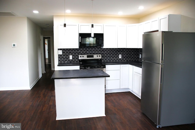 kitchen with a center island, white cabinets, dark hardwood / wood-style floors, and appliances with stainless steel finishes