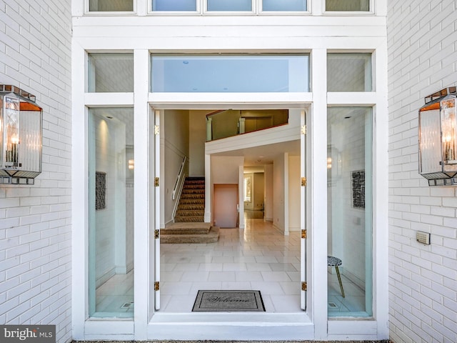 view of exterior entry with a garage