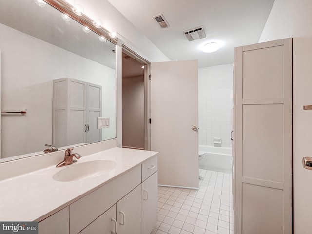 full bath with vanity, visible vents, and tile patterned floors