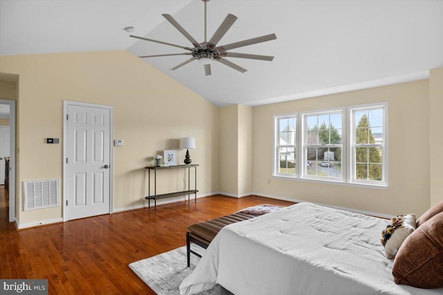 bedroom with lofted ceiling, hardwood / wood-style flooring, and ceiling fan