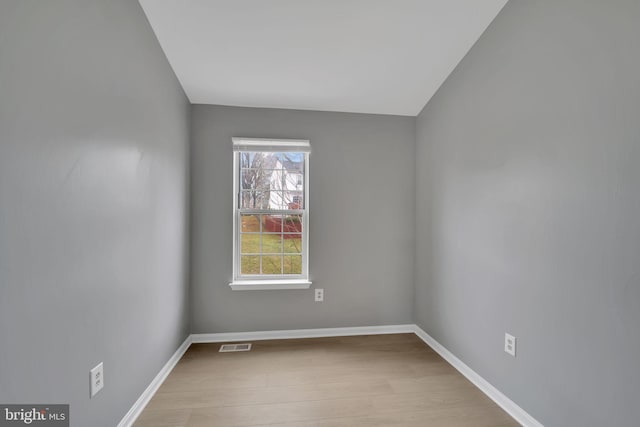 unfurnished room featuring light hardwood / wood-style flooring