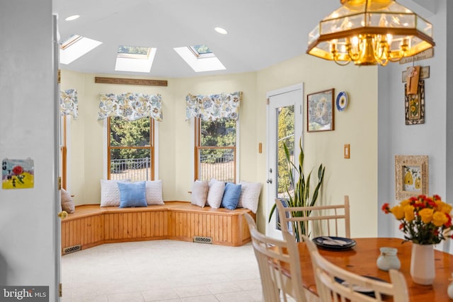 dining room with a chandelier