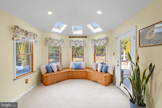 living area featuring lofted ceiling