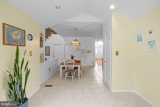 dining space with light tile patterned floors