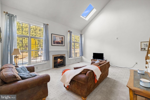 living room featuring light colored carpet, high vaulted ceiling, and plenty of natural light