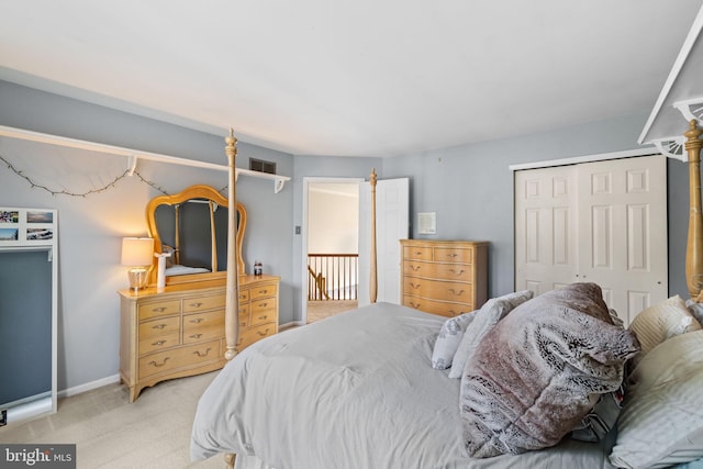 carpeted bedroom featuring a closet