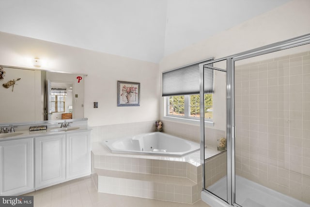 bathroom with separate shower and tub, tile patterned flooring, vanity, and vaulted ceiling