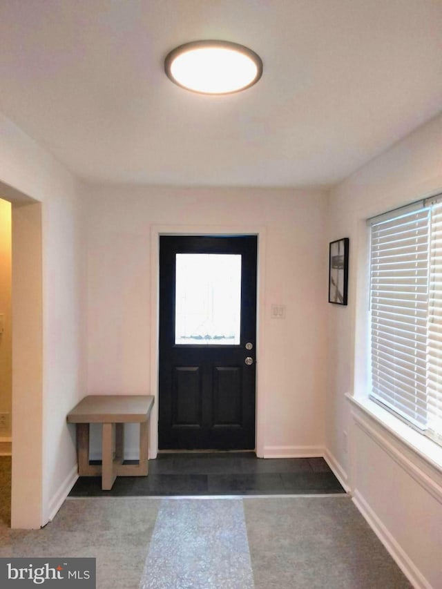 foyer featuring a wealth of natural light