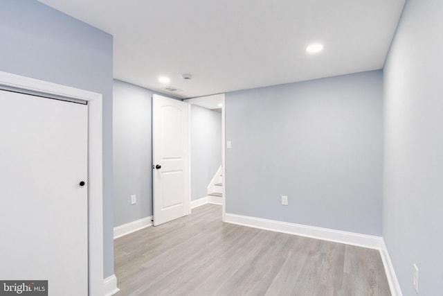 basement with light wood-type flooring