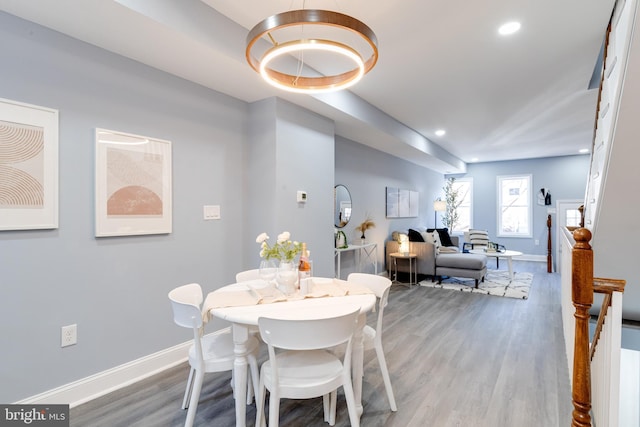 dining area with hardwood / wood-style floors