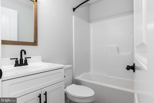 full bathroom with vanity, bathtub / shower combination, and toilet