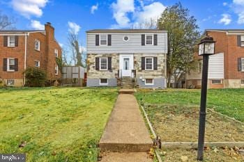 view of front of house with a front yard