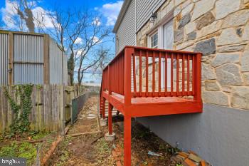 exterior space featuring a wooden deck