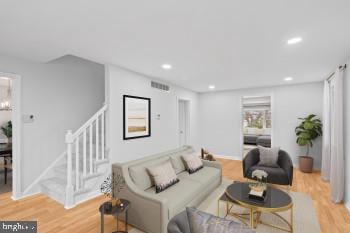 living room featuring light wood-type flooring