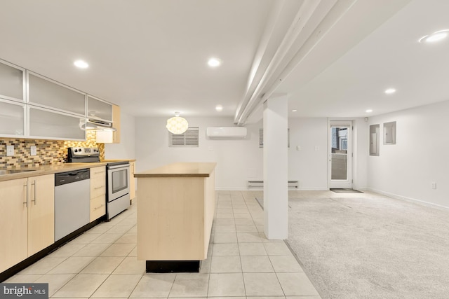 kitchen featuring light carpet, baseboard heating, a wall unit AC, a center island, and stainless steel appliances