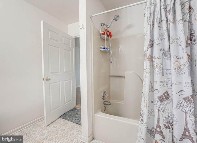 bathroom with shower / bath combo with shower curtain