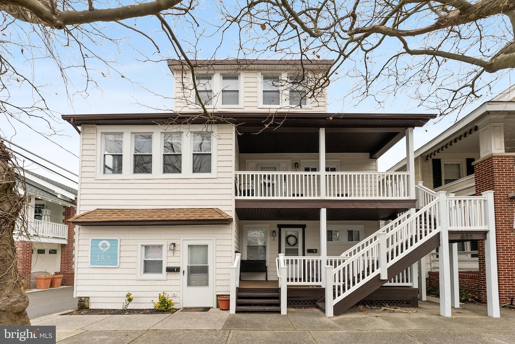 view of front of property with a balcony