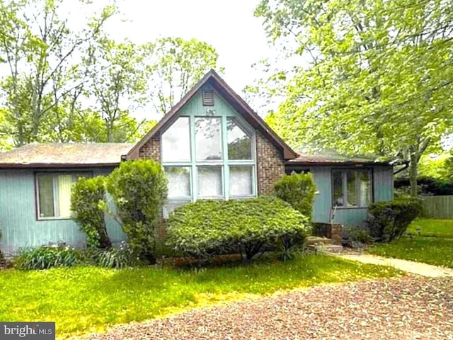 exterior space with a front yard