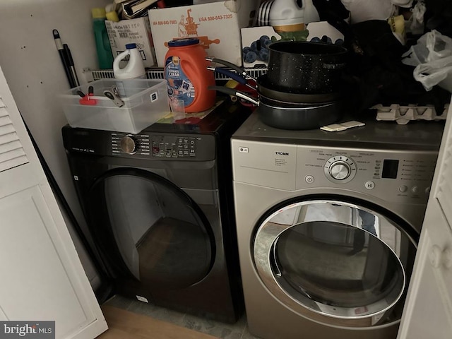 laundry room with washing machine and dryer