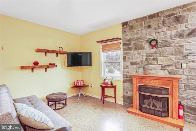 living room featuring a fireplace