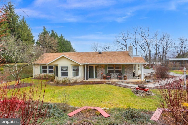 ranch-style home with a patio area and a front yard