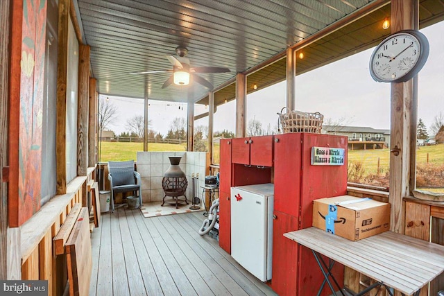 wooden deck with ceiling fan