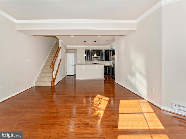 unfurnished living room featuring dark wood-type flooring and ornamental molding