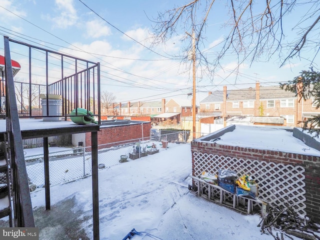 view of yard covered in snow