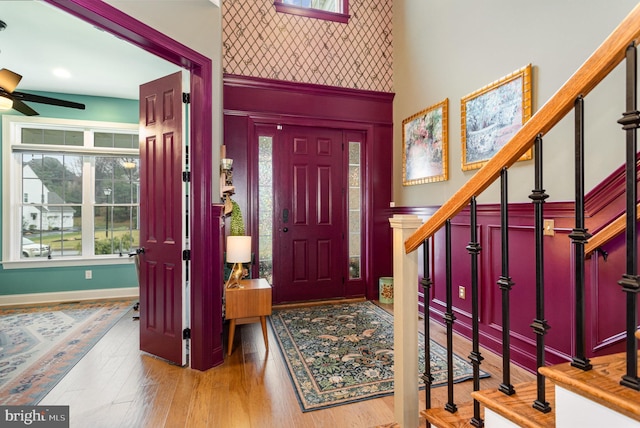 foyer entrance featuring ceiling fan and hardwood / wood-style floors