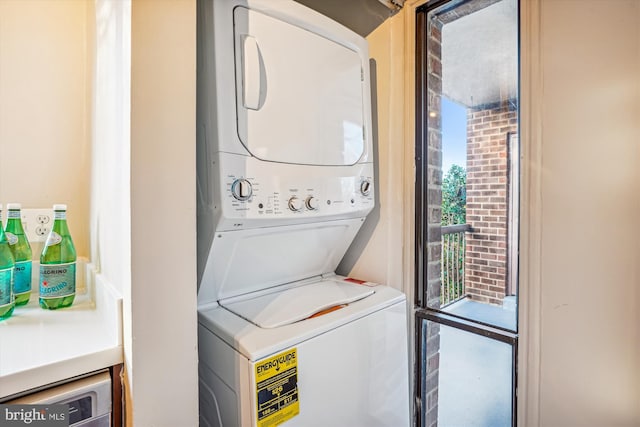 laundry area with stacked washer / dryer