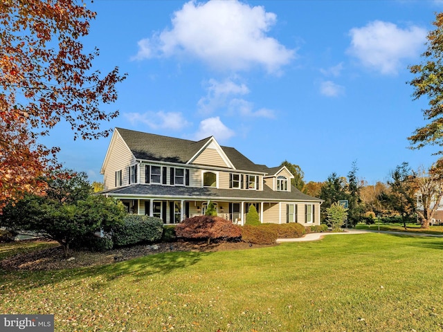 view of front of home with a front yard