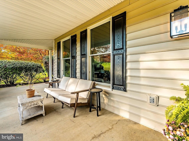 view of patio featuring a porch