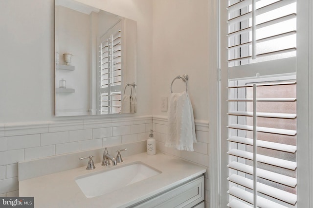 bathroom featuring vanity and a wealth of natural light