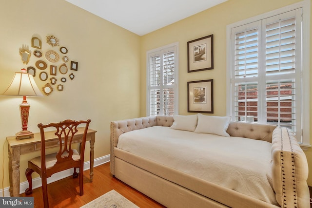 bedroom with wood-type flooring