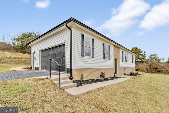 view of front of property featuring a garage and a front yard