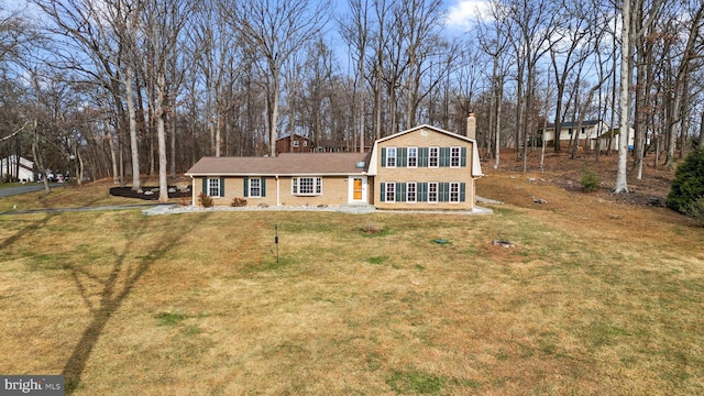 view of front of home with a front yard