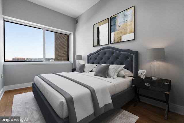 bedroom with wood-type flooring