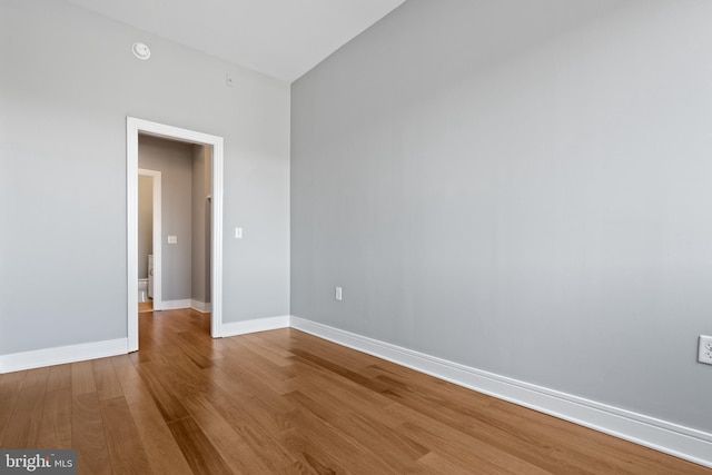 empty room featuring wood-type flooring