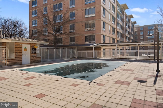 view of pool featuring a patio